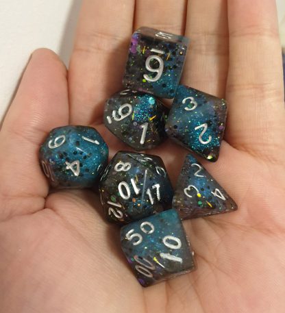Handmade polyhedral dungeons and dragons dice set in aqua and black with glitter