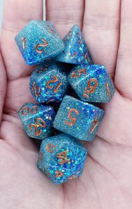 Handmade polyhedral dungeons and dragons dice set in aqua and blue with glitter