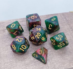 Green and red nebula galaxy effect dungeons and dragons polyhedral dice set