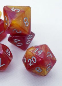 Yellow and red nebula galaxy effect dungeons and dragons polyhedral dice set