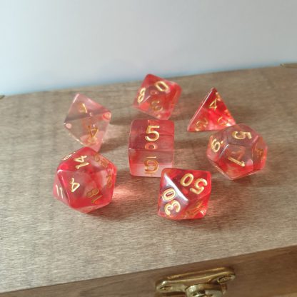 Red and gold polyhedral dungeons and dragons dice set