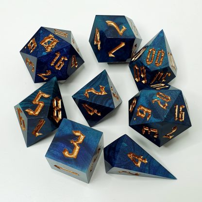 Blue back and teal dirty pour sharp edge handmade polyhedral dungeons and dragons dice set